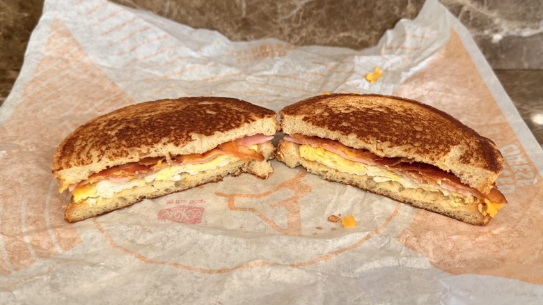 Jack in the Box Supreme Sourdough Breakfast Sandwich cut in half