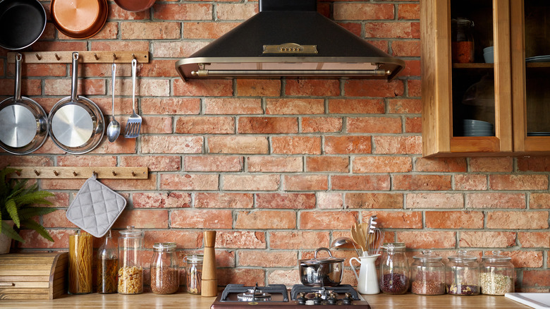 Exposed brick walls in kitchen