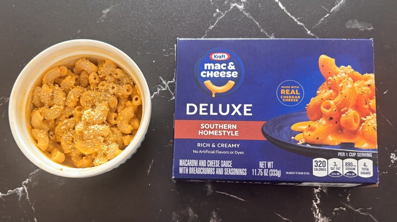 Kraft deluxe Southern homestyle mac and cheese box next to bowl of mac and cheese