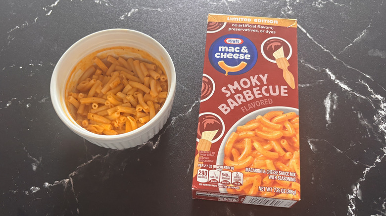 Kraft smoky barbecue mac and cheese box next to bowl of mac and cheese