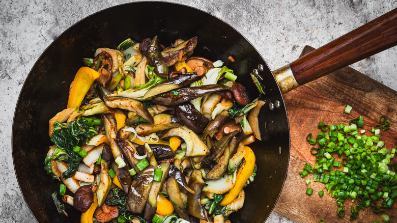Stir fry in wok with sauce