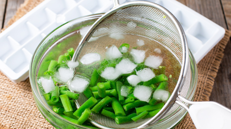 Green beans in ice bath after blanching