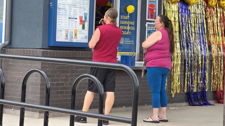 People at the Dutch Bros kiosk