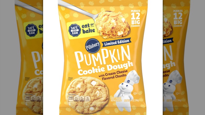 A package of Pillsbury Ready to Bake! Pumpkin Shape Sugar Cookie Dough against a white backdrop