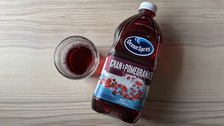 Ocean Spray Cran x Pomegranate juice on wooden table
