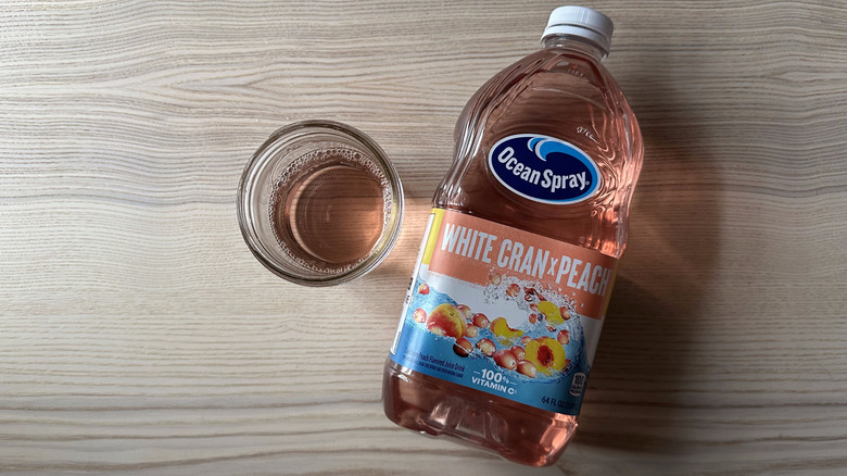 Ocean Spray White Cranberry juice on wooden table