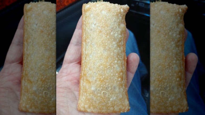 McDonald's Fried Apple Pie held in someone's hand