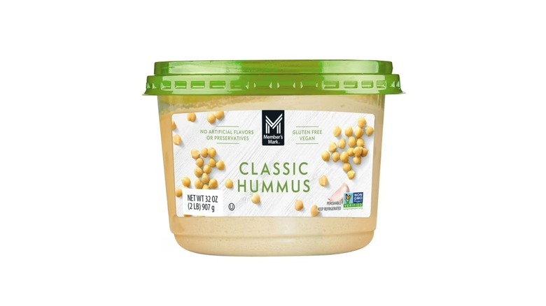 A container of Member's Mark Classic Hummus on a white background