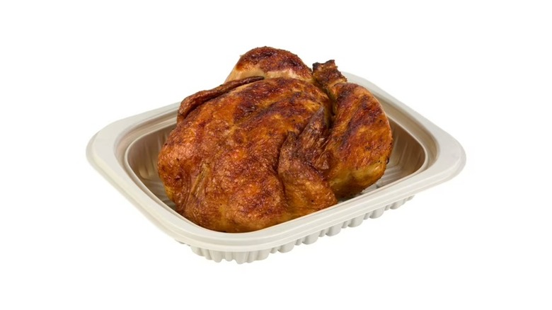 Member's Mark Seasoned Rotisserie Chicken in a plastic deli container