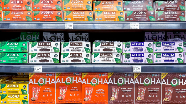 Boxes of Aloha bars on grocery store shelves