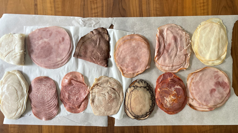 13 different Publix deli meats laid on a table