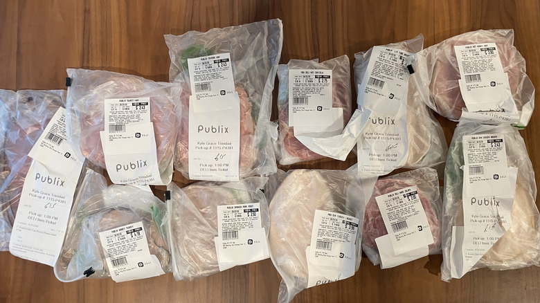 Assorted Publix deli meats in the wrapping containers