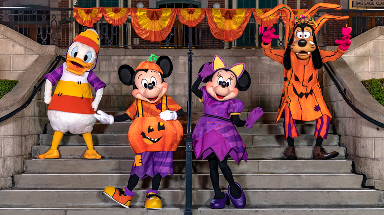 Disney characters in Halloween costumes