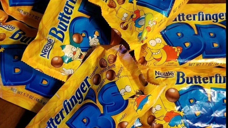 Pile of Butterfinger BB packages with "The Simpsons" characters