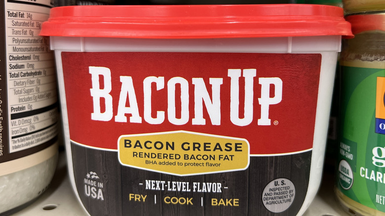 A tub of bacon grease on a supermarket shelf