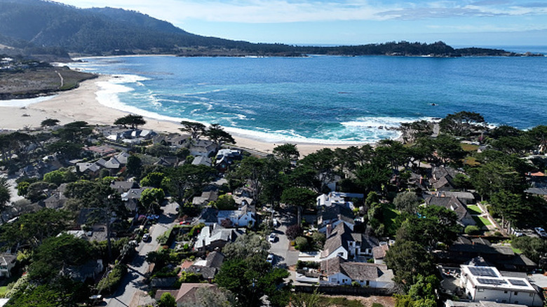 Carmel along the California coast with blue ocean waves and beach