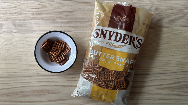 Snyder's Butter Snaps Pretzels on wooden table