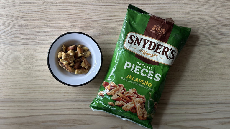 Snyder's Jalapeño Pretzel Pieces on wooden table