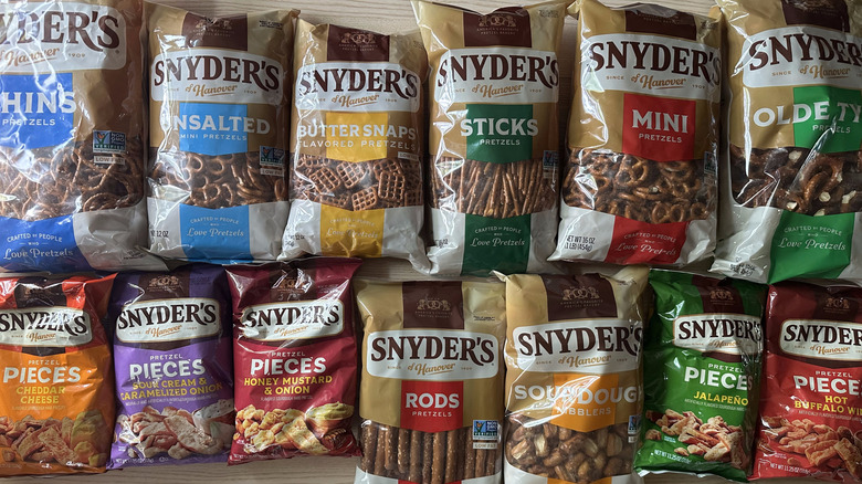Bags of Snyder's pretzels on wooden table
