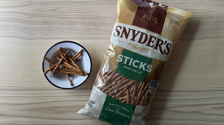 Snyder's Sticks Pretzels on wooden table