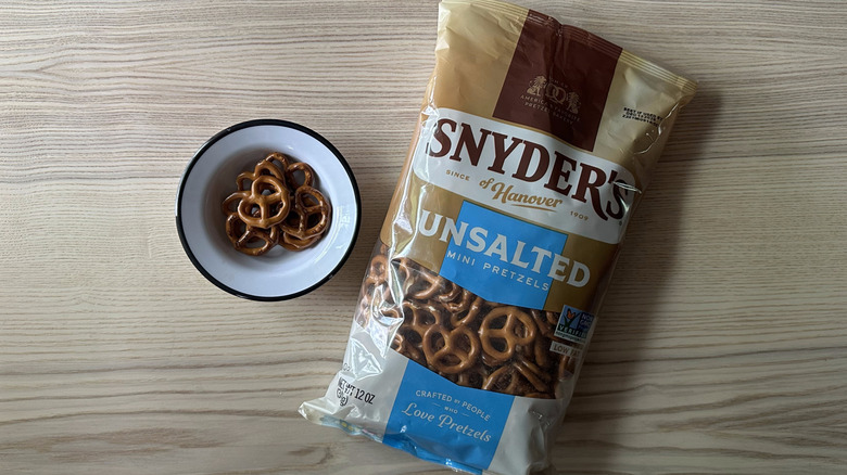 Snyder's Unsalted Mini Pretzels on wooden table