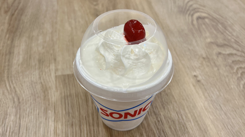 Sonic Vanilla Classic Shake in to-go cup.
