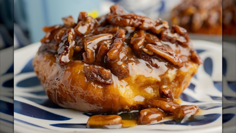 Sticky bun from Flour Bakery + Cafe on a blue and white plate