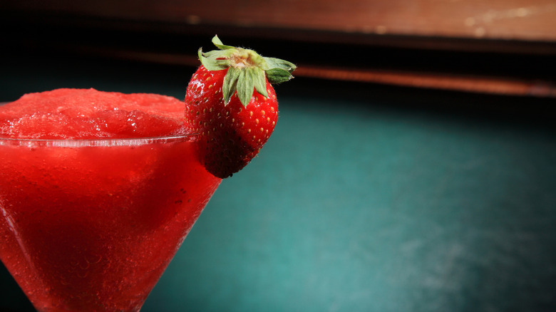 The top of a cocktail glass of frozen strawberry daiquiri