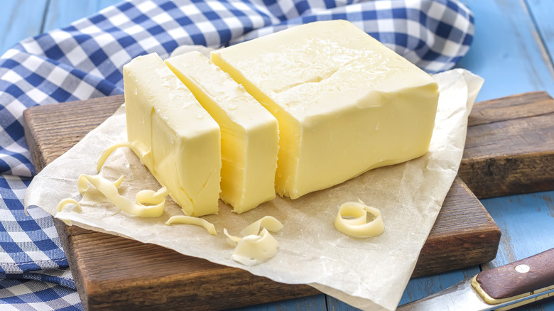 block of butter partly sliced