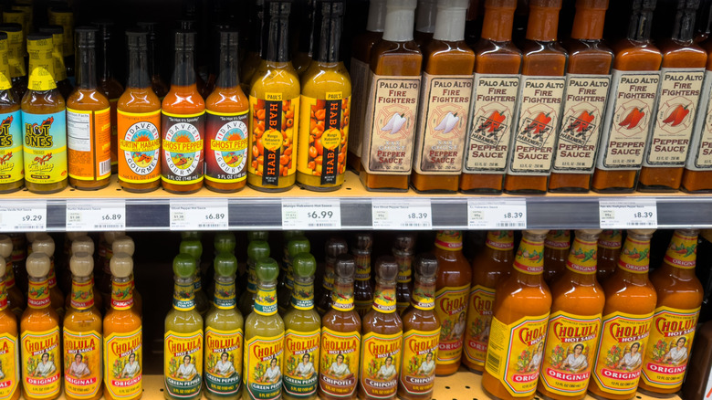 hot sauces on grocery shelf