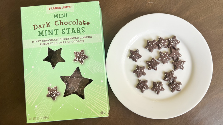 Trader Joe's Mini Dark Chocolate Mint Stars on a small plate next to box