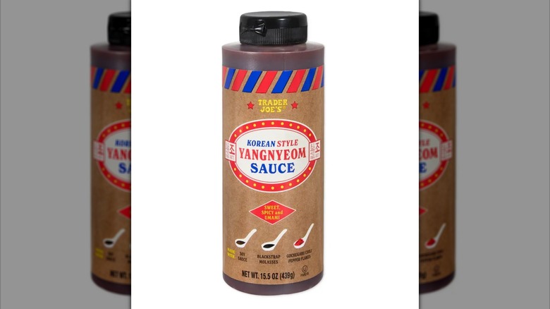 Trader Joe's Yangnyeom Sauce condiment in tall squeeze bottle with brown label