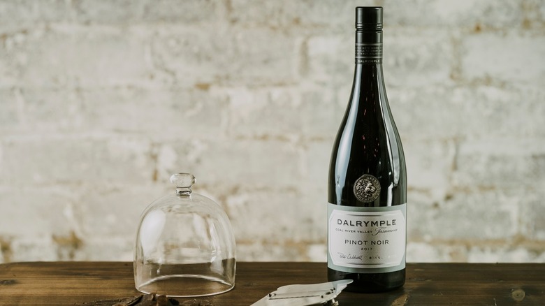 Dalrymple Vineyards bottle of Pinot Noir on wooden table