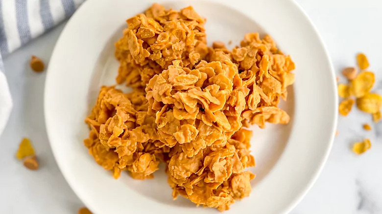 No-bake Cornflake Butterscotch cookies on a white plate.