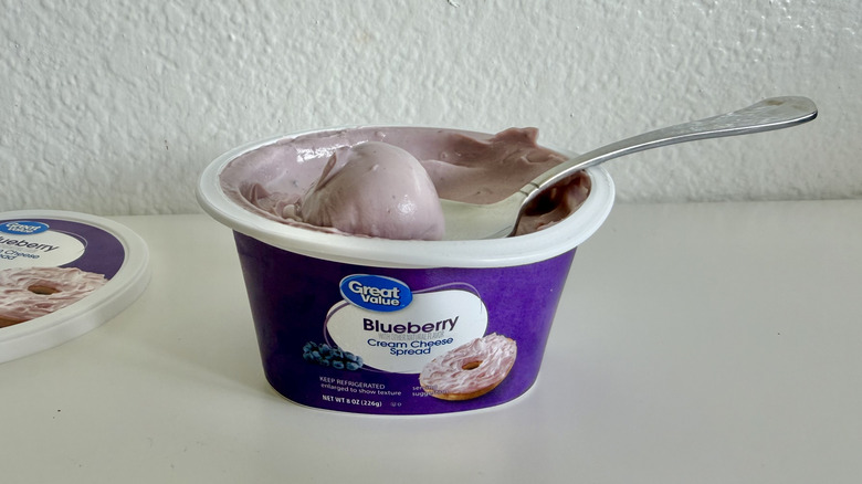 Big scoop of Great Value Blueberry Cream Cheese Spread on a spoon
