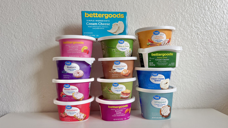 Walmart cream cheese containers on a table against a white background