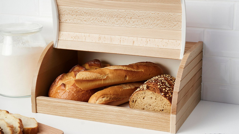 Ikea's Magasin bread bin with bread inside on a white table.