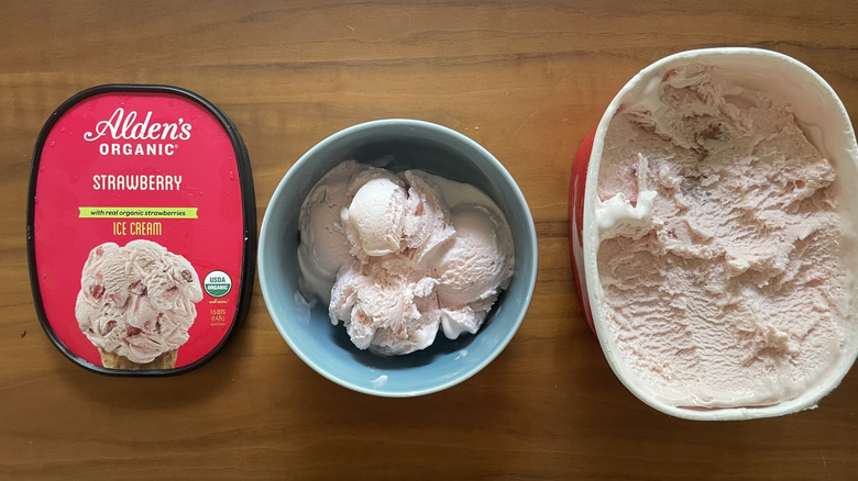 Strawberry ice cream in bowl and in container