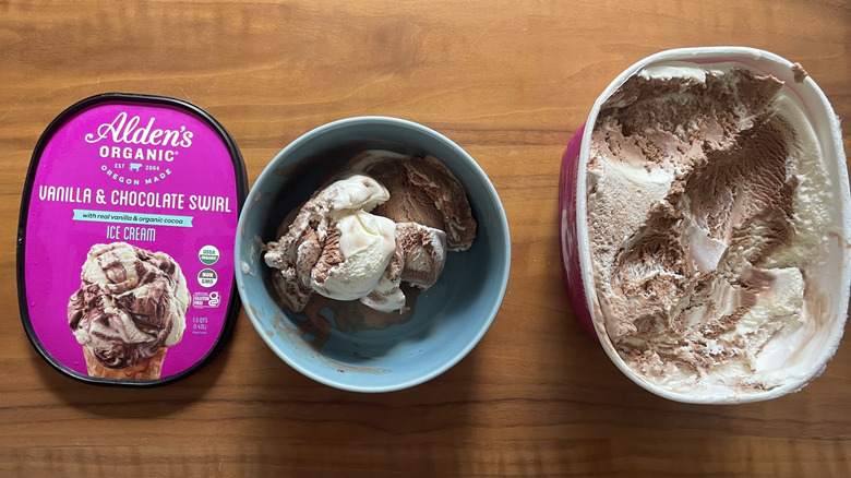 Vanilla and chocolate swirl ice cream in a bowl and in a container