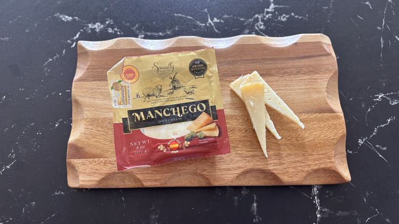 Aldi Manchego cheese on wooden board