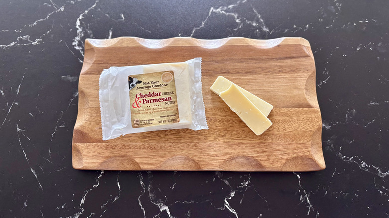 Aldi cheddar Parmesan cheese on wooden board