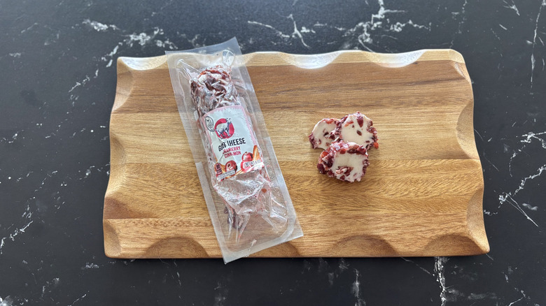 Aldi cranberry cinnamon goat cheese on wooden board