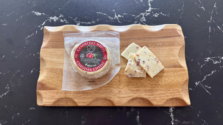 Aldi cranberry white cheddar cheese on wooden board