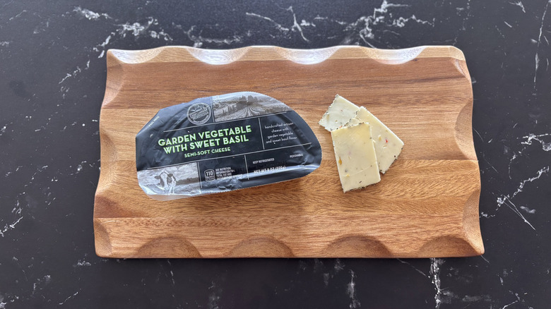 Aldi garden vegetable soft cheese on wooden board