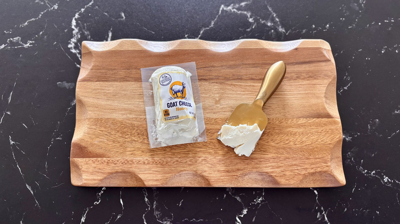 Aldi honey goat cheese on wooden board