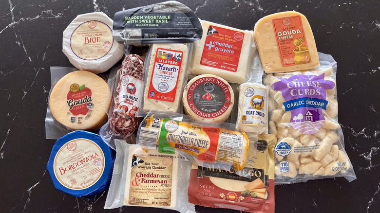 Various Aldi cheeses on countertop