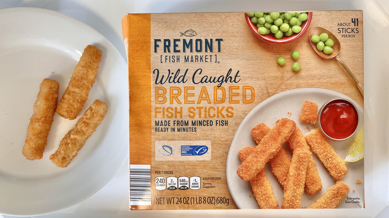 Three breaded fish sticks