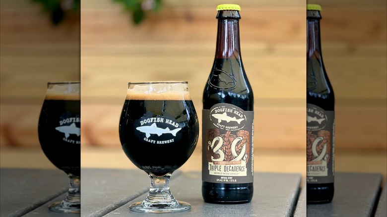 Bottle and glass of Dogfish Head Triple Decadence World Wide Stout