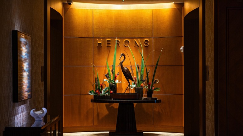 Heron figurine and vases on a table at Herons restaurant