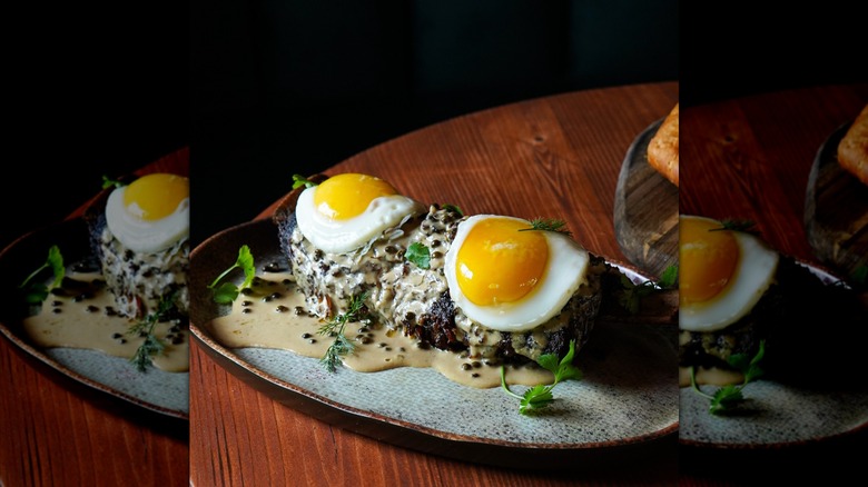 Smoked short rib with eggs plated at Phuc Yea